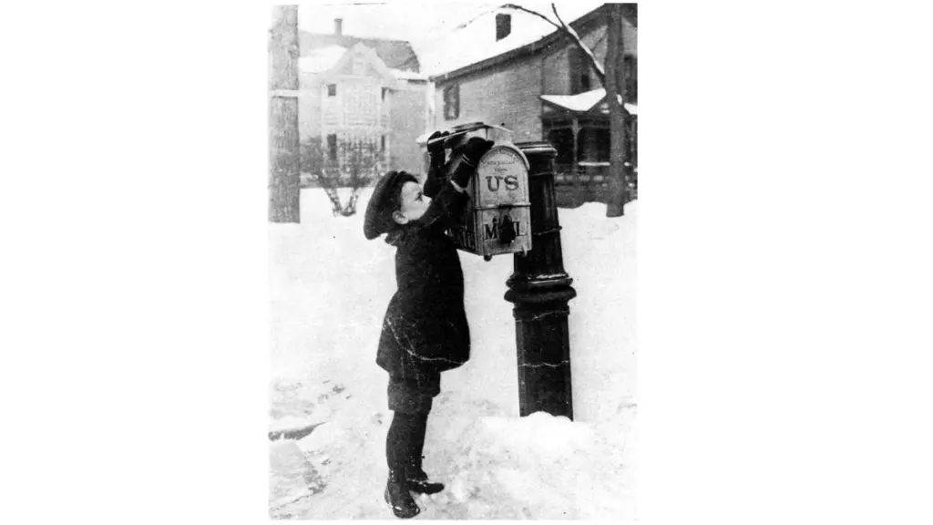 vintage photo of boy mailing a letter